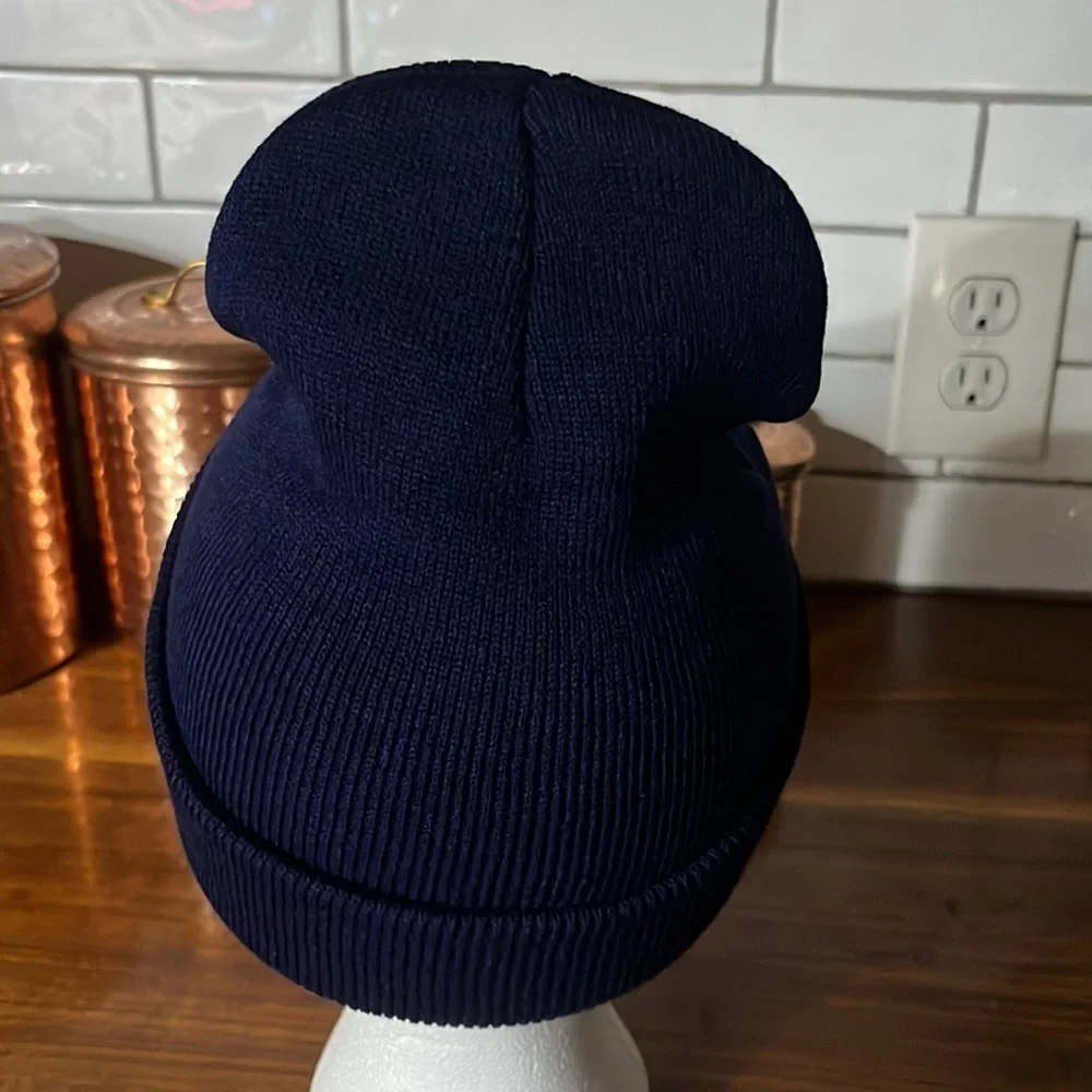 New hat with Grudens label.